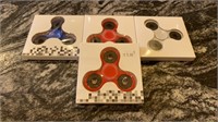 4 Fidget spinners - 2 red, one blue and one