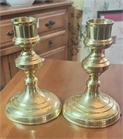 Pair of gold colored candle holders approx 8