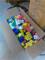 Box full of Mega Bloks building block toys