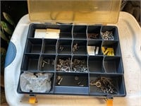 Storage container with screws, caps etc