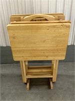 Set of 4 wooden TV trays on standing rack