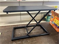 ADJUSTABLE TABLE