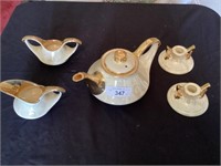 Pearl Co. 22 ct. Gold tea set & matching candle
