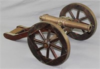 presentation cannon on wooden cart given to