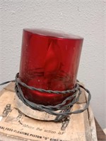 Vintage red revolving light and AC manifold