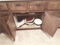contents of bottom cabinets - from sink to stove