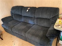 BLUE RECLINER SOFA ON BOTH ENDS.