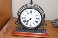 Standing metal clock with wooden base