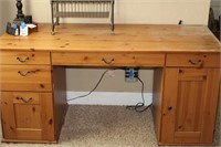 Large wooden desk with drawers