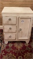 Small storage cabinet. Height 15 1/2”. Width 12”