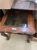 Glass top end table approximately 26x23x 21