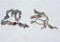 Pretty sterling bracelets with assorted stones.