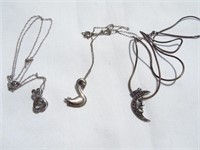 Sterling charm necklaces.