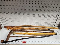 Lot of Handcarved Walking Sticks/canes