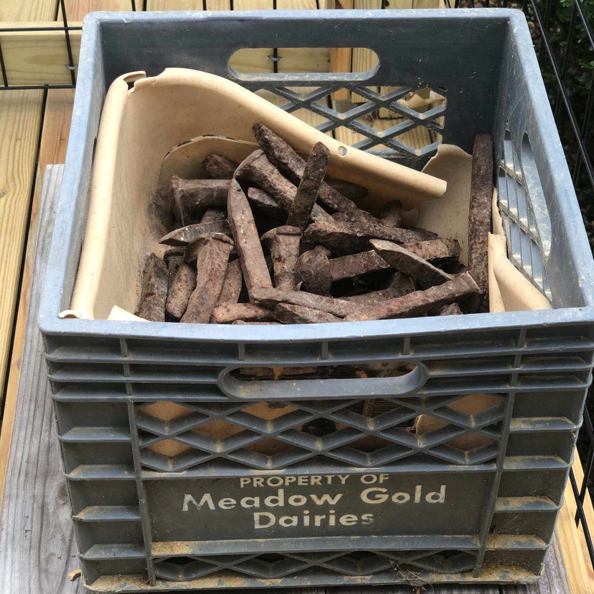 Meadow Gold Dairies Crate Full of Railroad Spikes