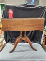 Drop leaf mahogany lamp table.  Look at the