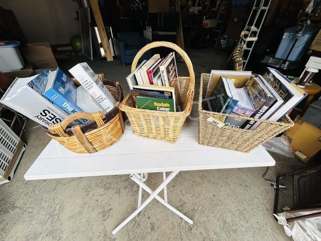 3 baskets various books