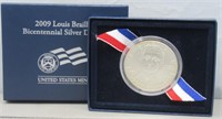 2009 Louis Braille Bicentennial Silver Dollar.