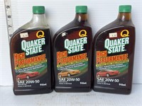 3 bottles of Quaker State motor oil
