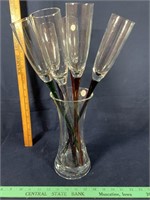 Footless long stem champagne flute glass in vase