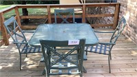 Patio table and chairs , 46 x 46 metal glass top