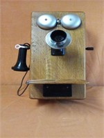 Vintage wooden hand cranked telephone 
Measures
