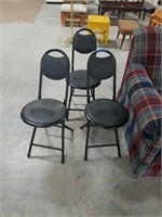 Three small folding chairs