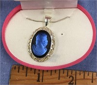 Silver toned pendant inlaid with a cameo unusual b