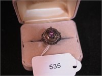 Sterling poison ring with purple-colored