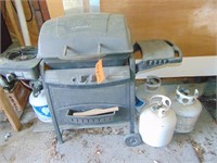Gas Grill and 4- Tanks