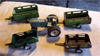 Green Tractor and 4 Trailers