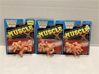 Three Packs of WWE Muscle Figures