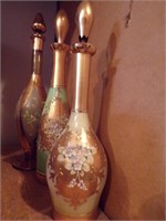 THREE(3) DECANTERS W/ FLORAL DESIGN