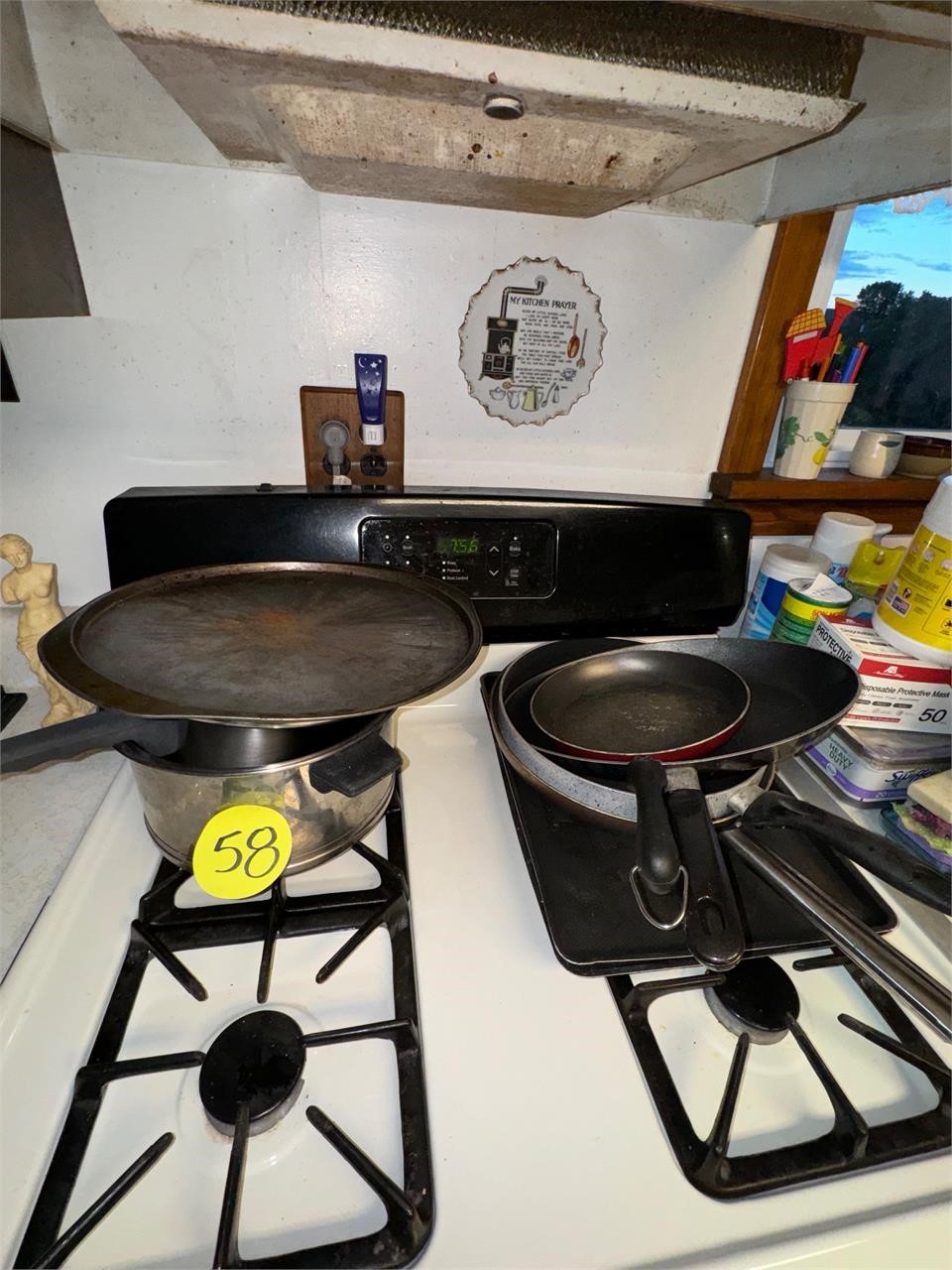 Kitchen pots, and pans .