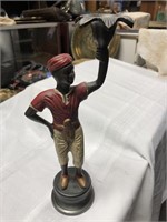 Vintage painted brass boy candle stick