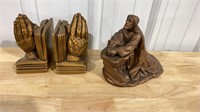 Bookends and praying figurine