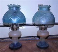 Pair of kerosene lamps w/ embossed glass shades