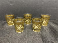 5 Valencia pattern gold and green shot glasses