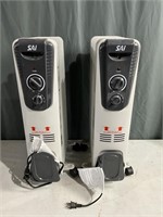 pair of like new Sai oil filled radiant heaters