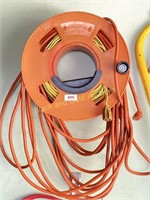 Pair of extension cords and cord reel