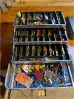 Vintage fishing tackle box full of contents