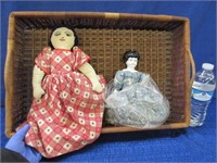 2 older dolls in basket