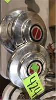 3 old hubcaps