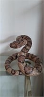 Rattlesnake sculpture.   Base is approximately 8"