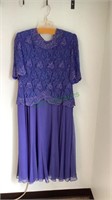 Beautiful blue dress with beads on the top and a