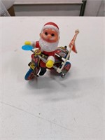 Key wind tin Santa toy