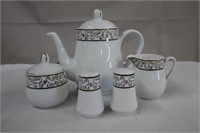 8.5" teapot with matching cream, covered sugar,