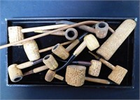 COLLECTION OF COB TOBACCO PIPES