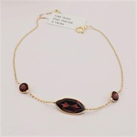 10KT. YELLOW GOLD 11.75MM X 6MM GENUINE GARNET