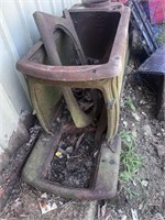 Cast iron  stove, missing two legs